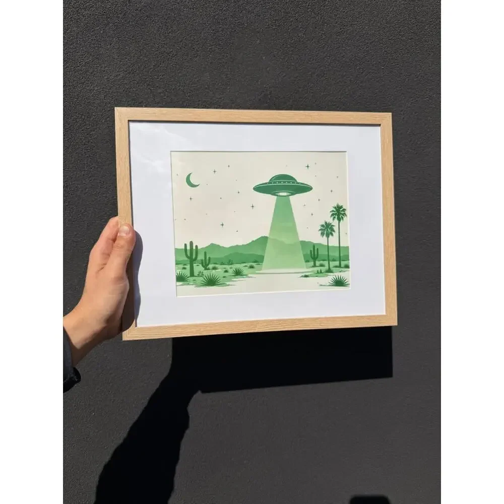 Framed Green UFO Desert Night Scene Art Print — Natural Wood Frame